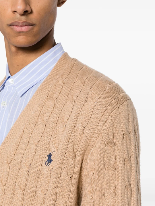 Close up of tan cardigan,showing texture of the cotton fabric