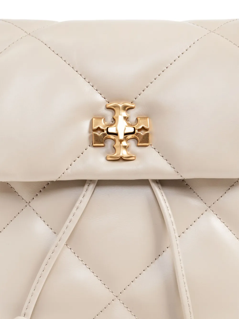 close up of white bags, showing texture of the leather fabric