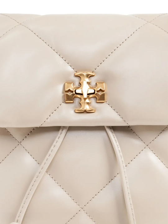 close up of white bags, showing texture of the leather fabric