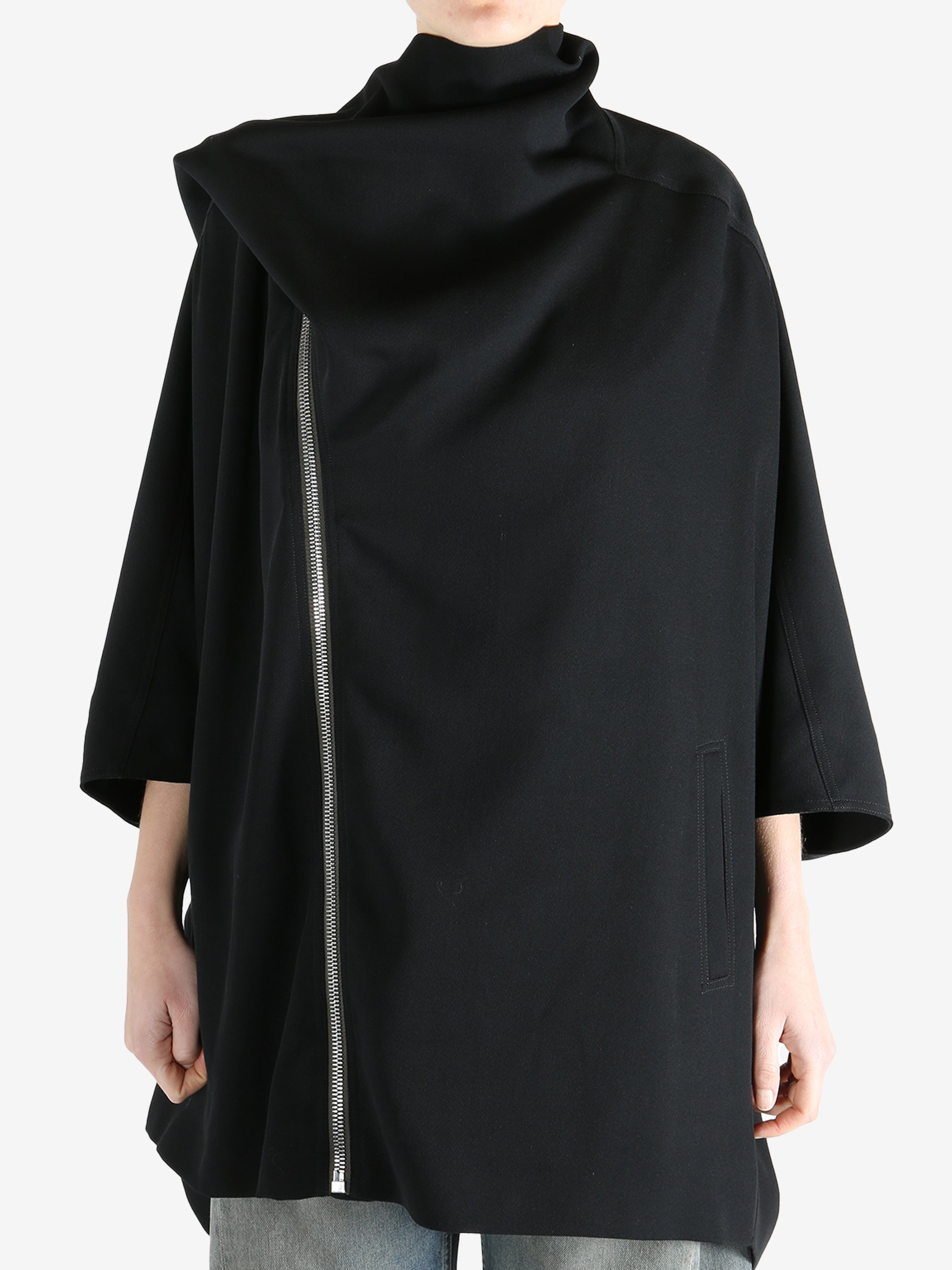 Black jackets worn by a person, showing the jackets fit