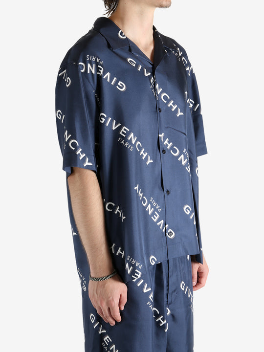 Navy shirt worn by a person, showing the shirt's fit