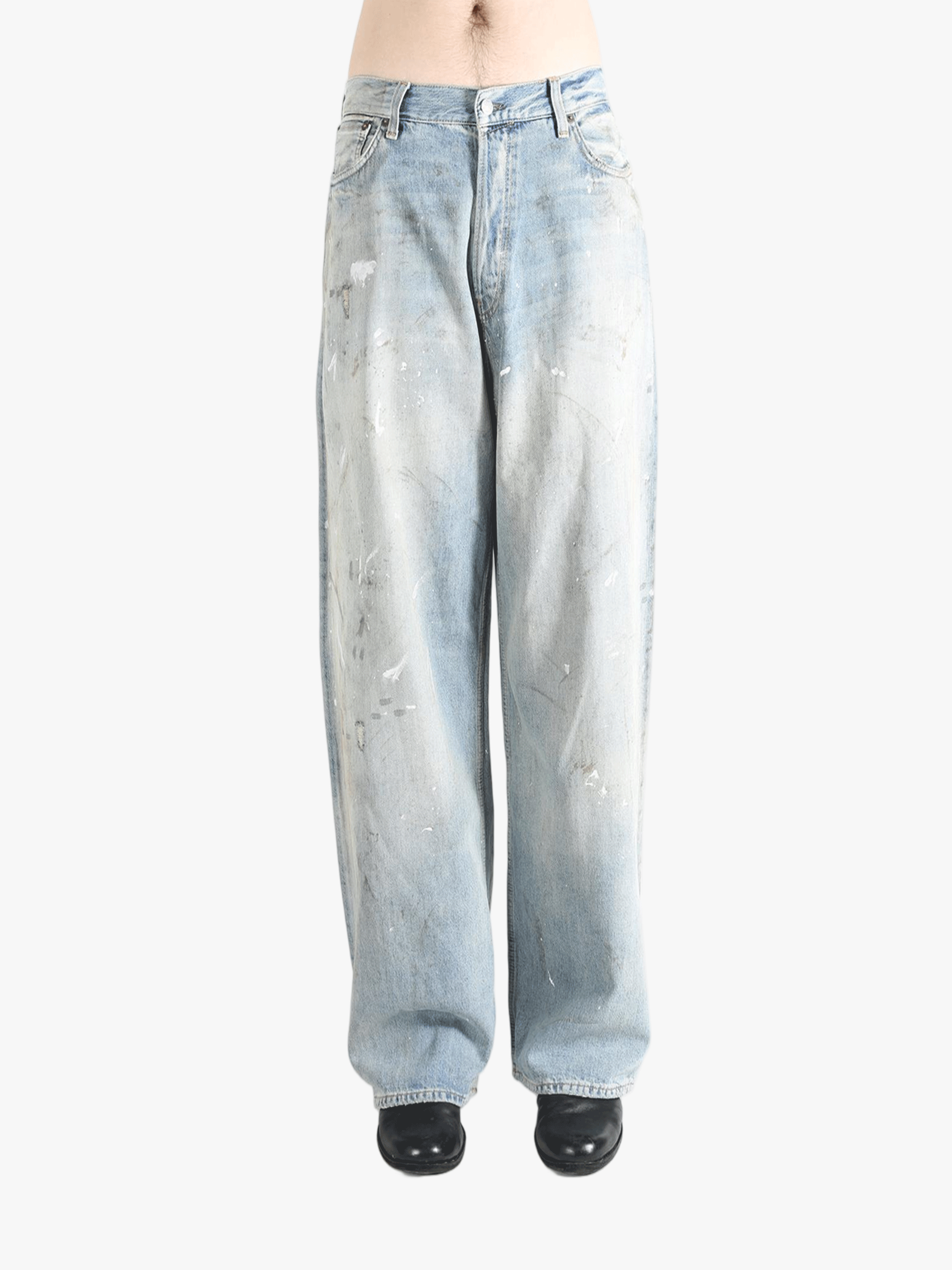 Blue jeans worn by a person, showing the jeans's fit