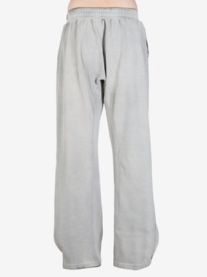 Grey pant,worn by a person, showing the pant's fit