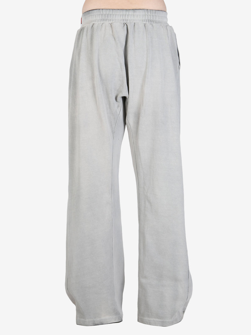 Grey pant,worn by a person, showing the pant's fit