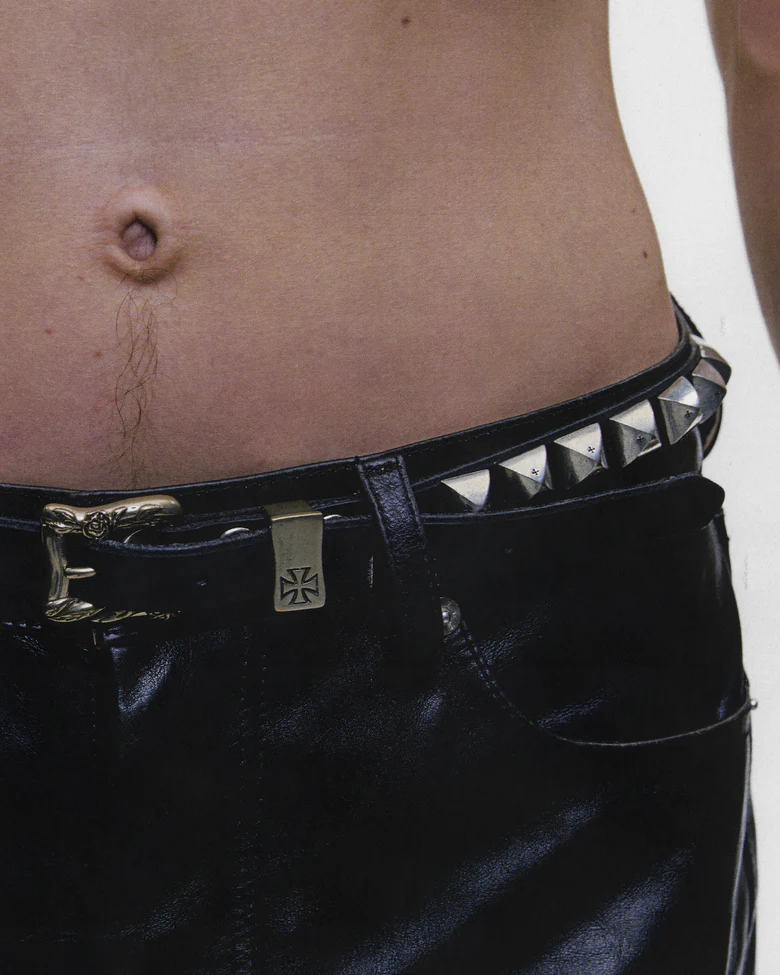 Black accessories worn by a person, showing the accessories fit