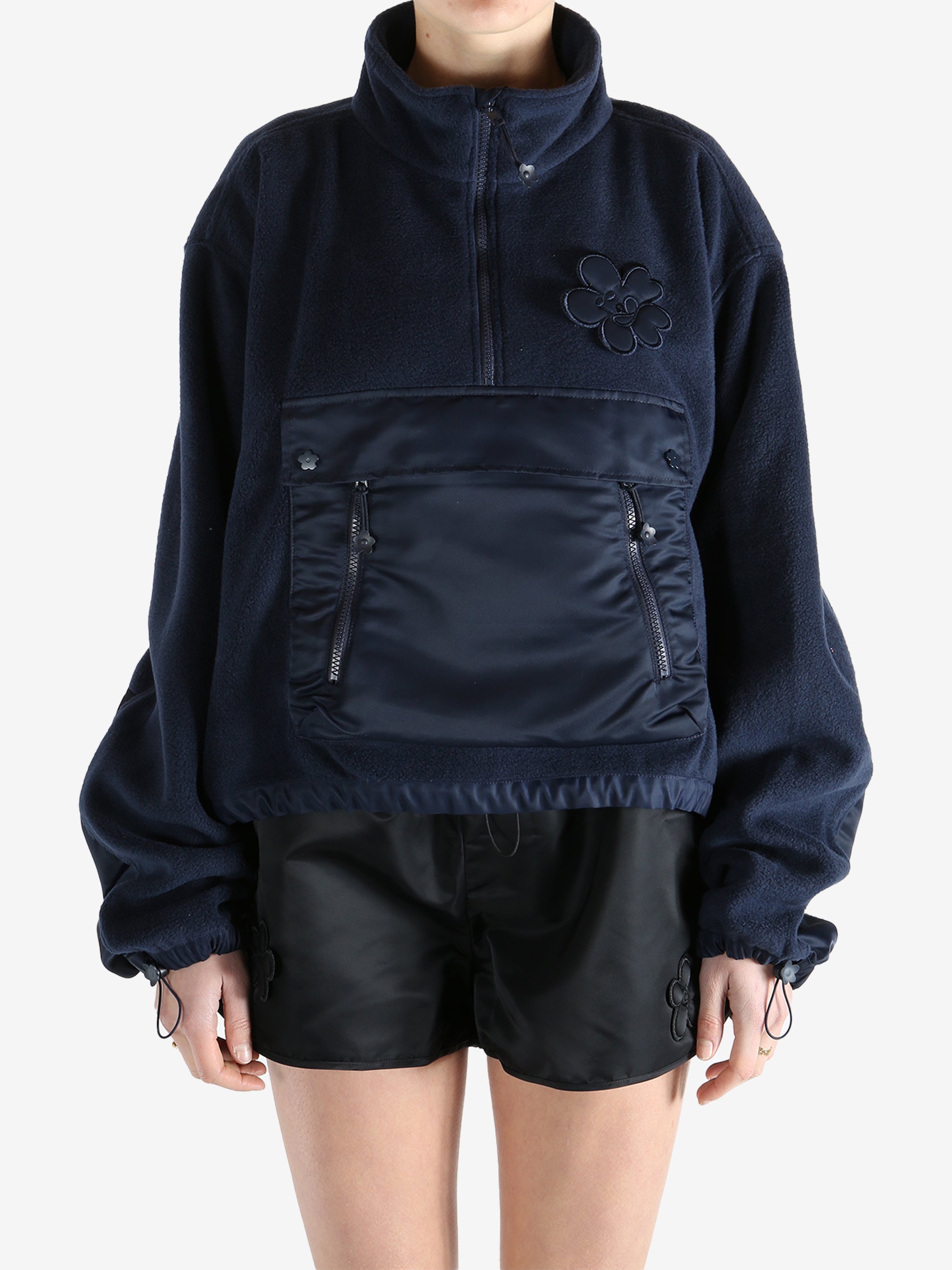 Navy jacket worn by a person, showing the jacket's fit