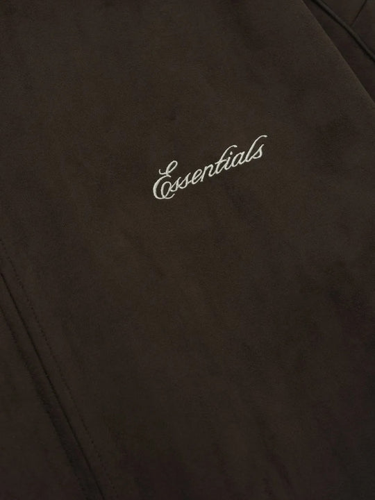 Close up of brown jacket, showing texture of the polyester fabric