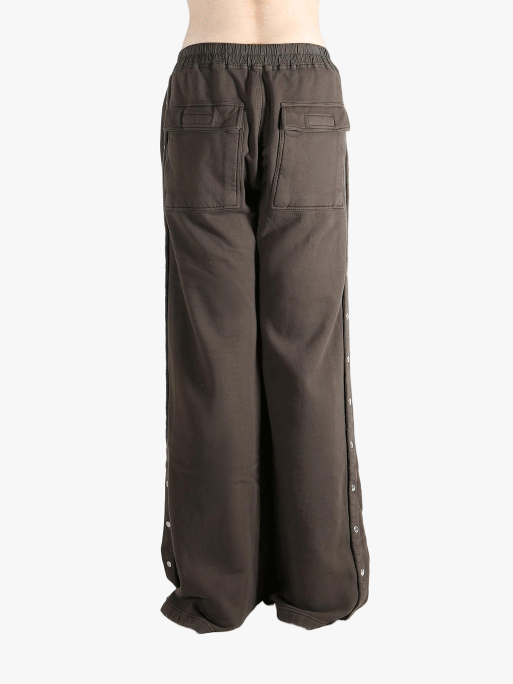 Brown pant worn by a person, showing the cotton fit