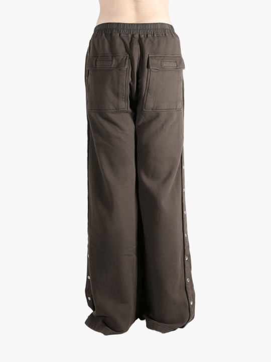 Brown pant worn by a person, showing the cotton fit