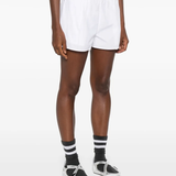 White short worn by a person, showing the short fit