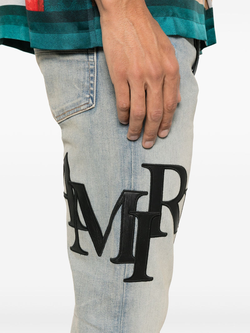 AMIRI - Men Staggered Logo Skinny Jean