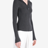 Grey hoodie worn by a person, showing the hoodie fit