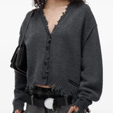 Grey knitwear, full body view
