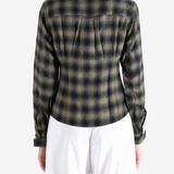 Brown shirt worn by a person, showing the shirt fit