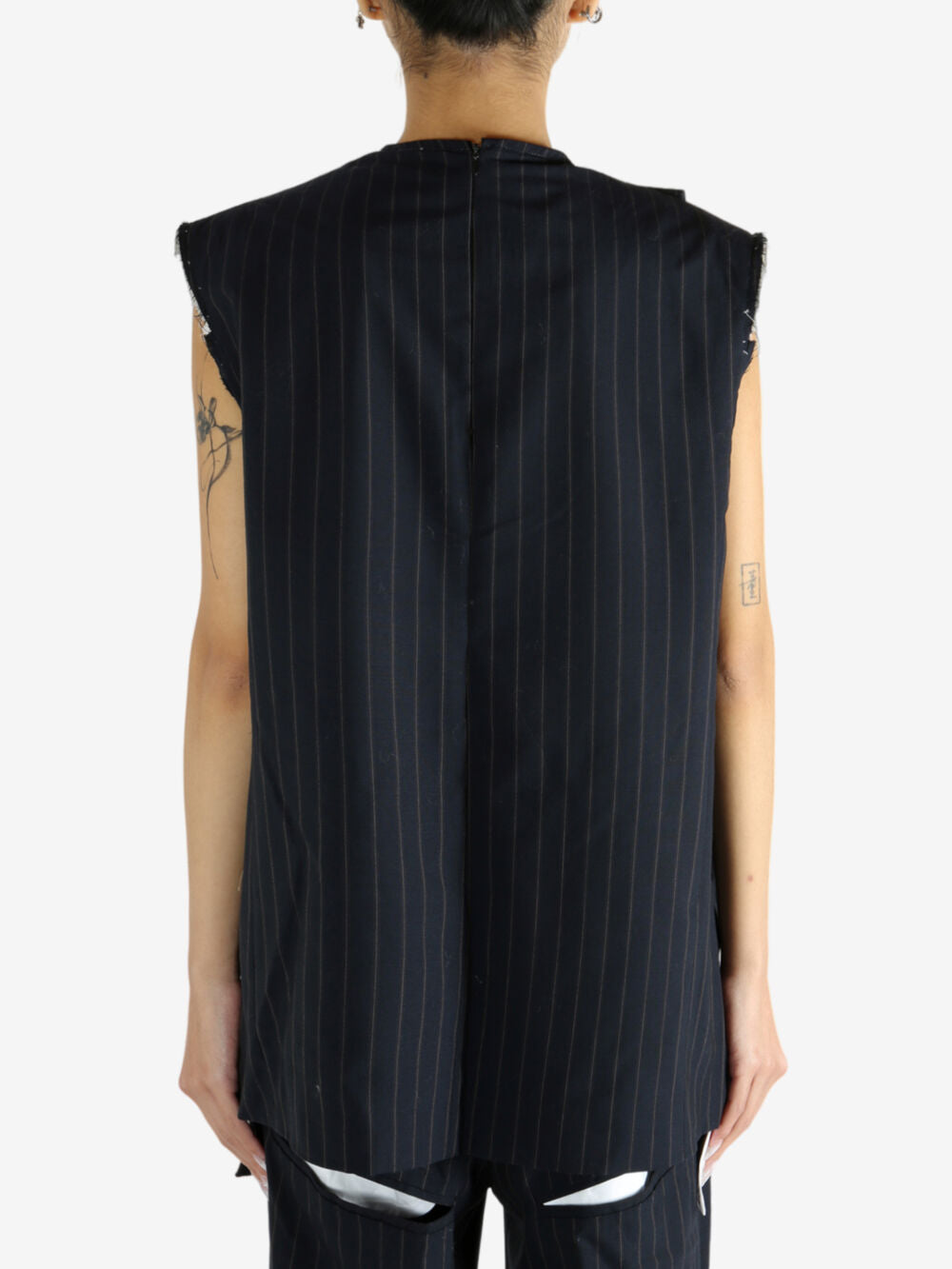 Navy dress worn by a person, showing the dress' fit