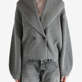  gray sweater  worn by a person, showing the sweater fit