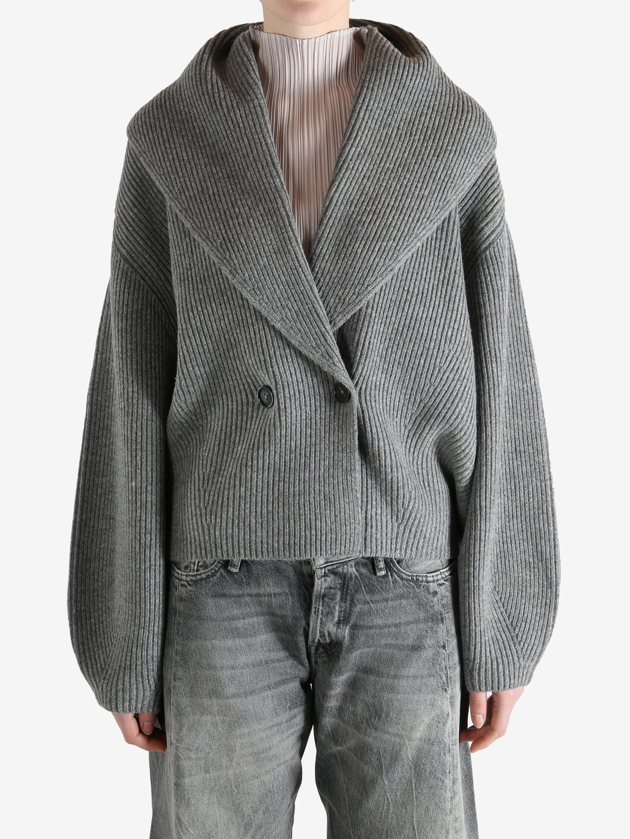  gray sweater  worn by a person, showing the sweater fit