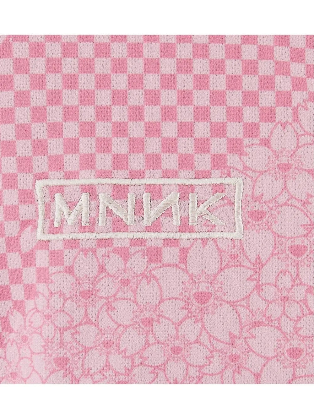 Close up of Pink t-shirt, showing texture of the 100% polyester fabric