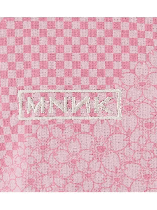 Close up of Pink t-shirt, showing texture of the 100% polyester fabric