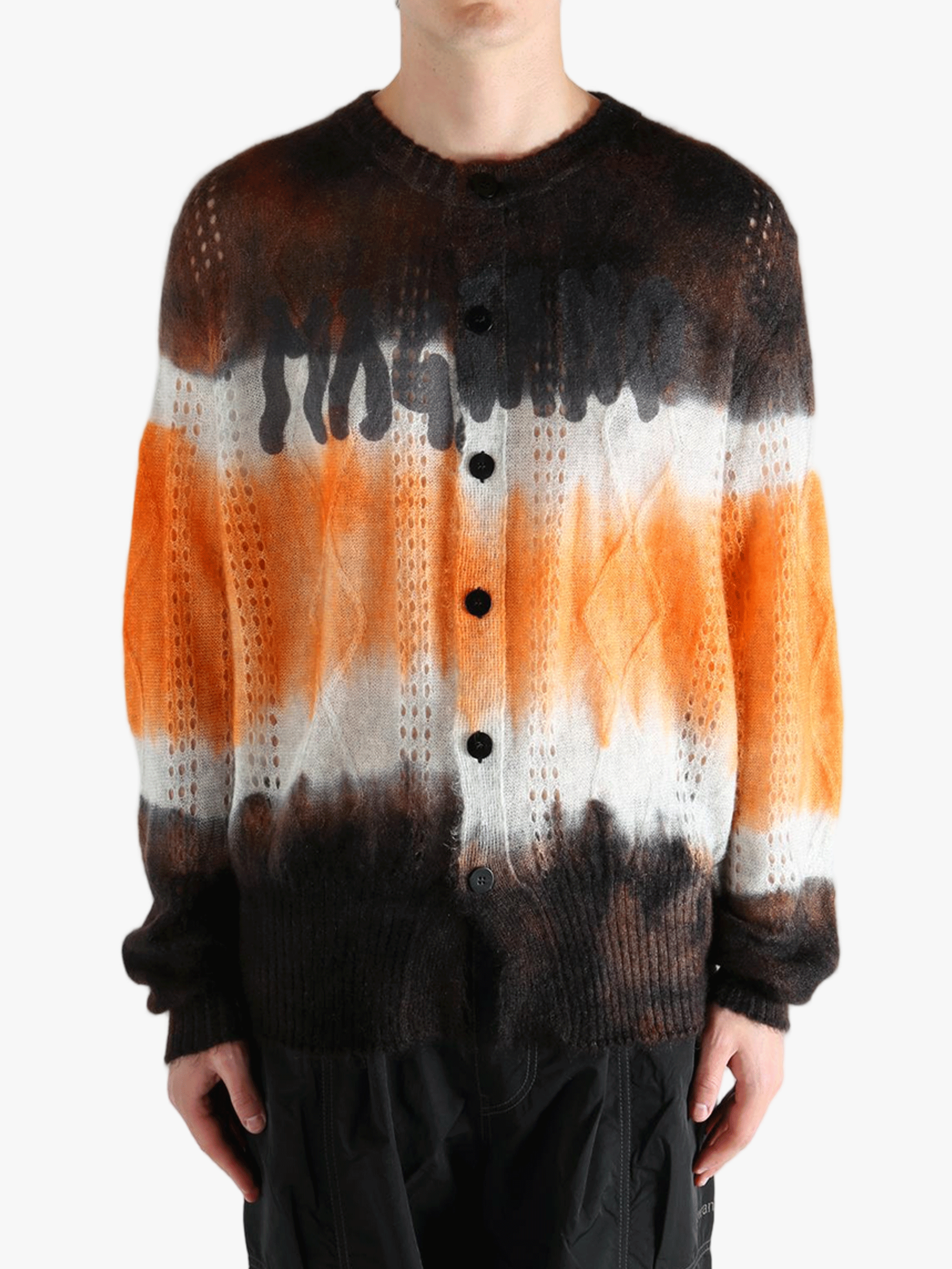 Orange cardigan worn by a person, showing the cardigan's fit