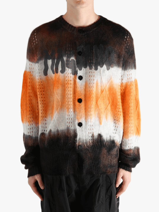 Orange cardigan worn by a person, showing the cardigan's fit