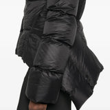 Black jacket worn by a person, showing the jacket fit