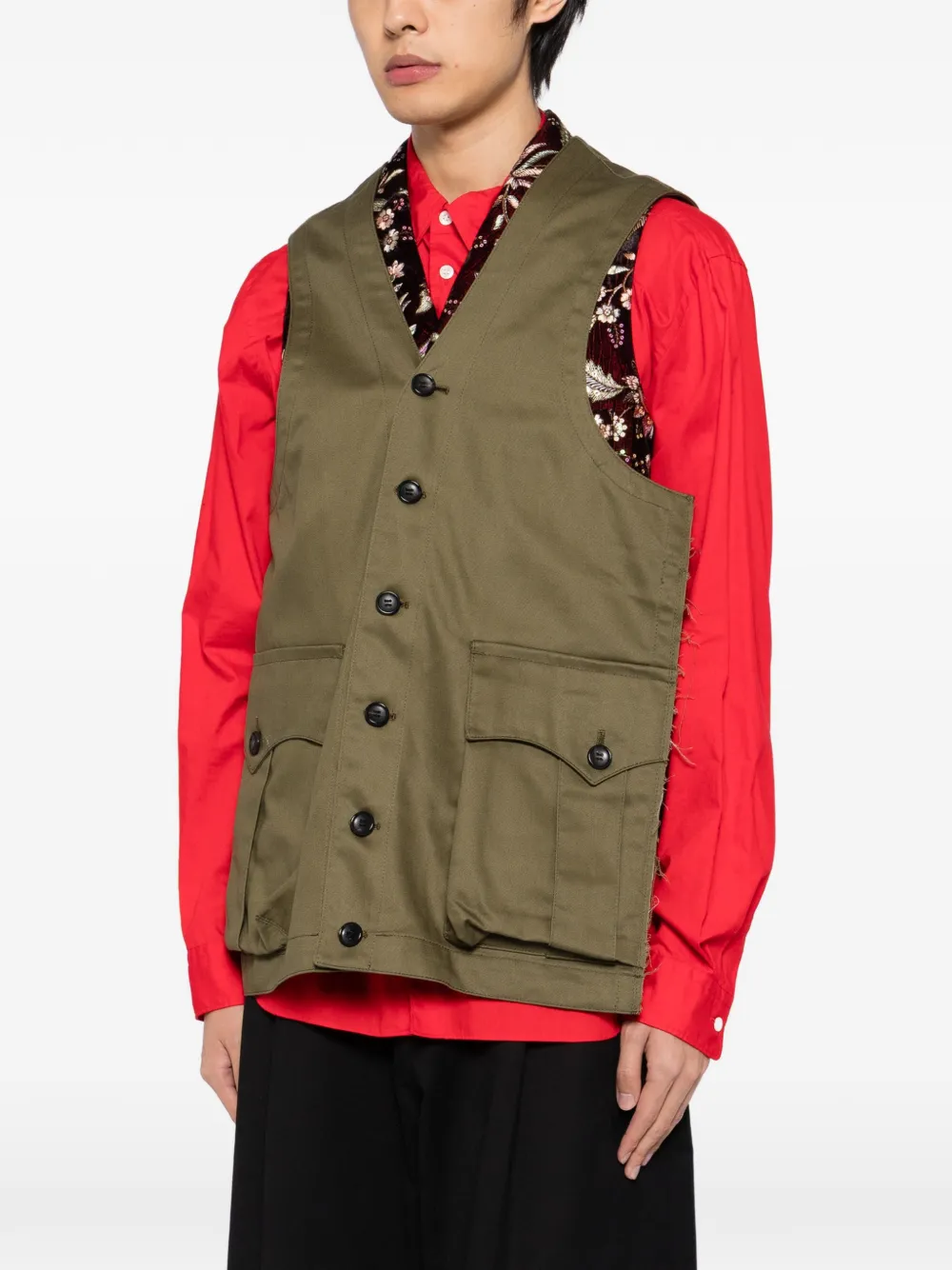 Brown vest worn by a person, showing the vest fit