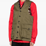 Brown vest worn by a person, showing the vest fit