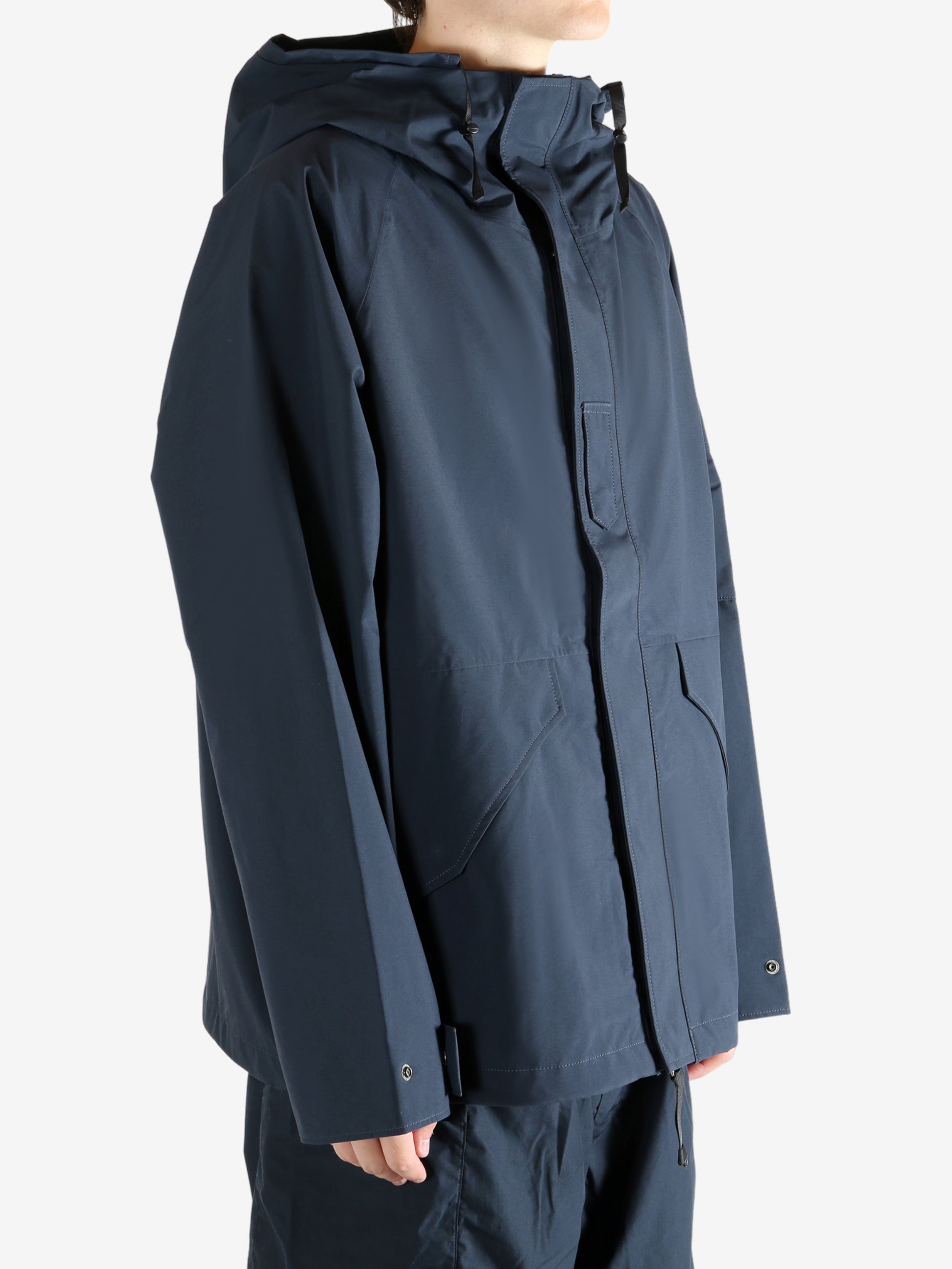 Navy jacket worn by a person, showing the jacket's fit