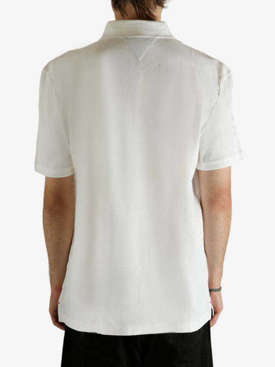 White shirt worn by a person, showing the shirt fit