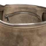 Close up of the grey bag, showing texture of the suede fabric