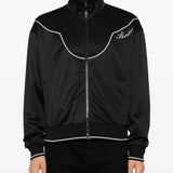 Black jacket worn by a person, showing the jacket fit
