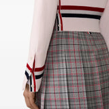 Pink knitwear worn by a person, showing the knitwear fit