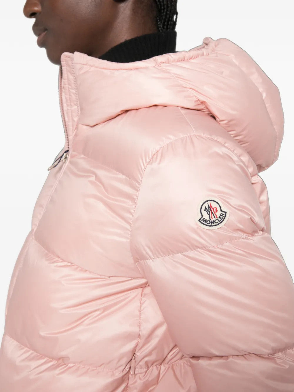 Pink jacket worn by a person, showing the jacket fit