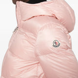 Pink jacket worn by a person, showing the jacket fit