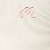 Close up of White shirt, showing texture of the 84% nylon/ 16% elastane fabric