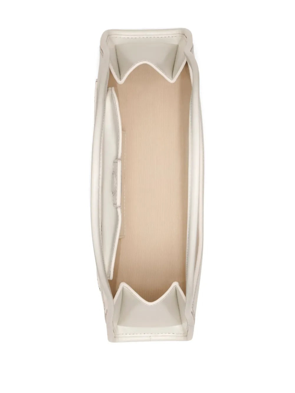 Close up of the white bag, showing texture of the leather fabric