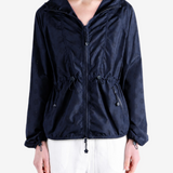 Navy jacket worn by a person, showing the jacket fit