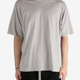 Grey shirts worn by a person, showing the shirt's fit