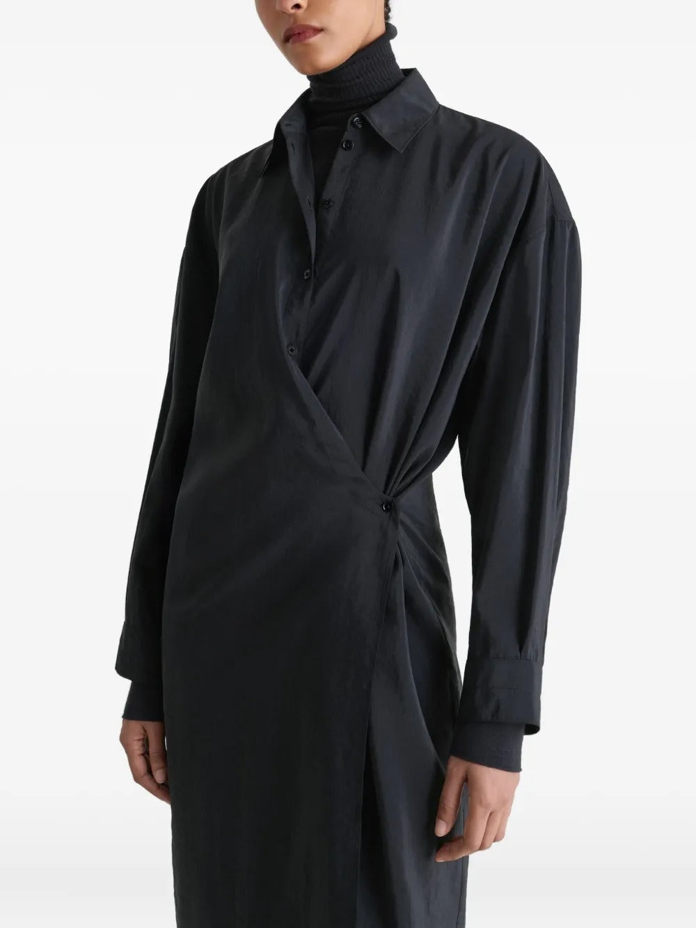 Close up of the black dress, showing texture of the silk and nylon fabric