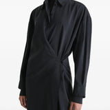 Close up of the black dress, showing texture of the silk and nylon fabric