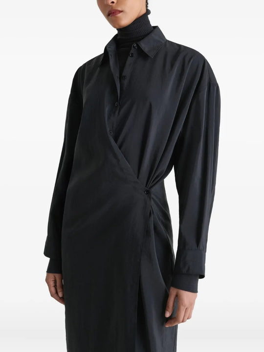 Close up of the black dress, showing texture of the silk and nylon fabric