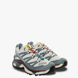 Blue sneakers, side view