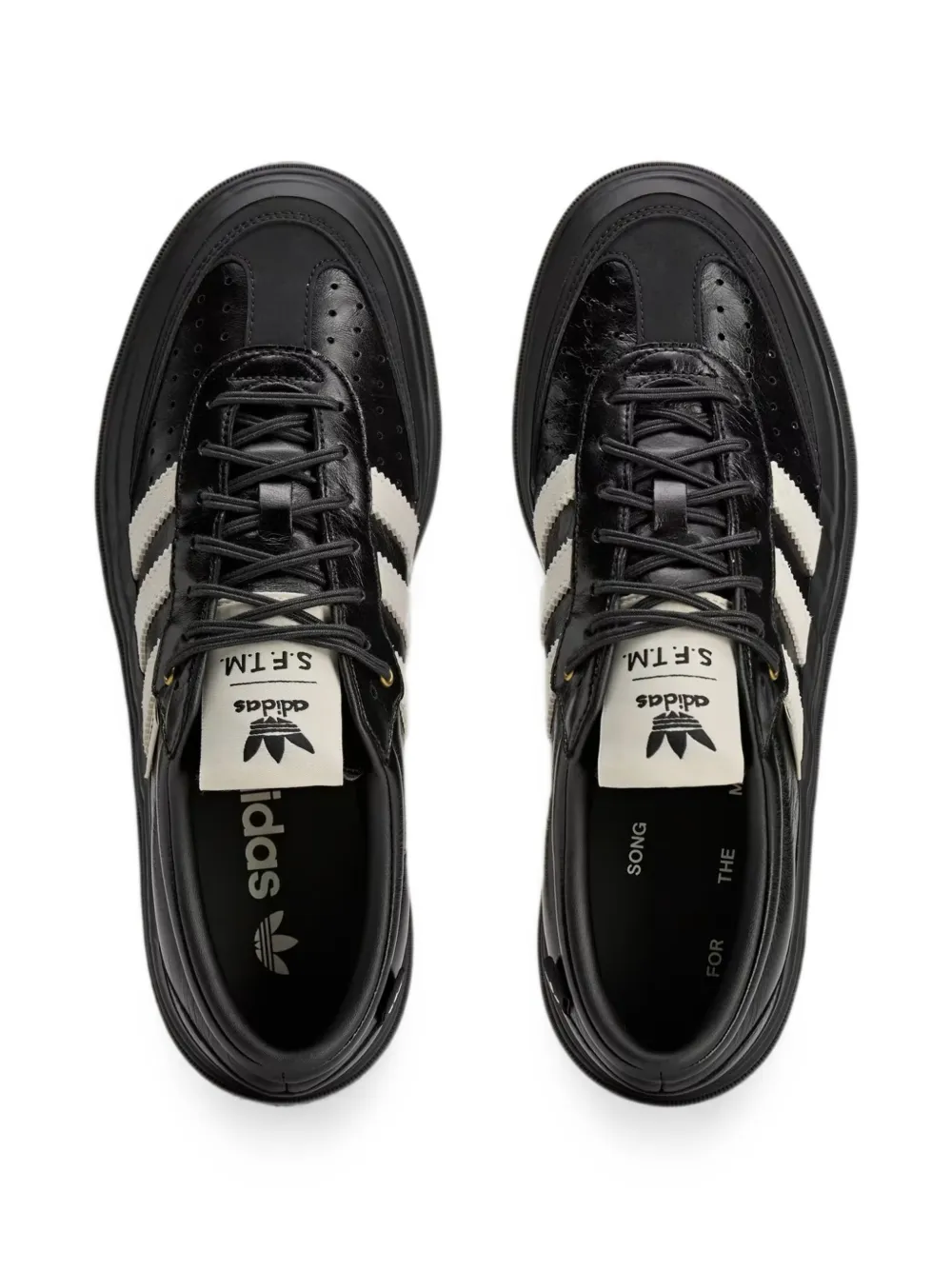 Black sneakers, vertical view