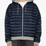 Grey hoodie worn by a person, showing the hoodie fit