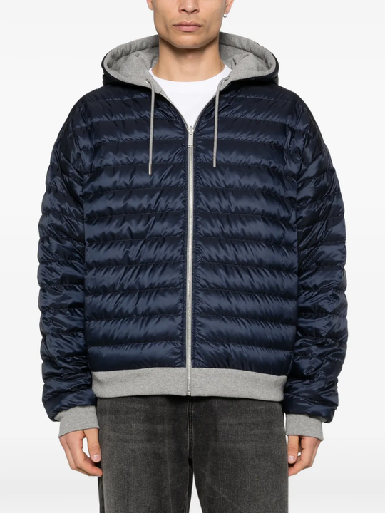 Grey hoodie worn by a person, showing the hoodie fit