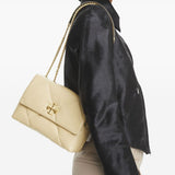 Yellow bags worn by a person, showing the bags fit