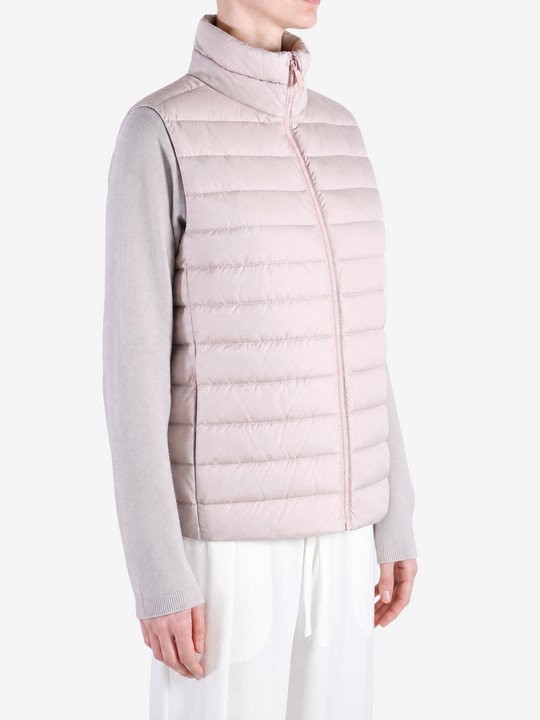 Pink jacket worn by a person, showing the jacket fit