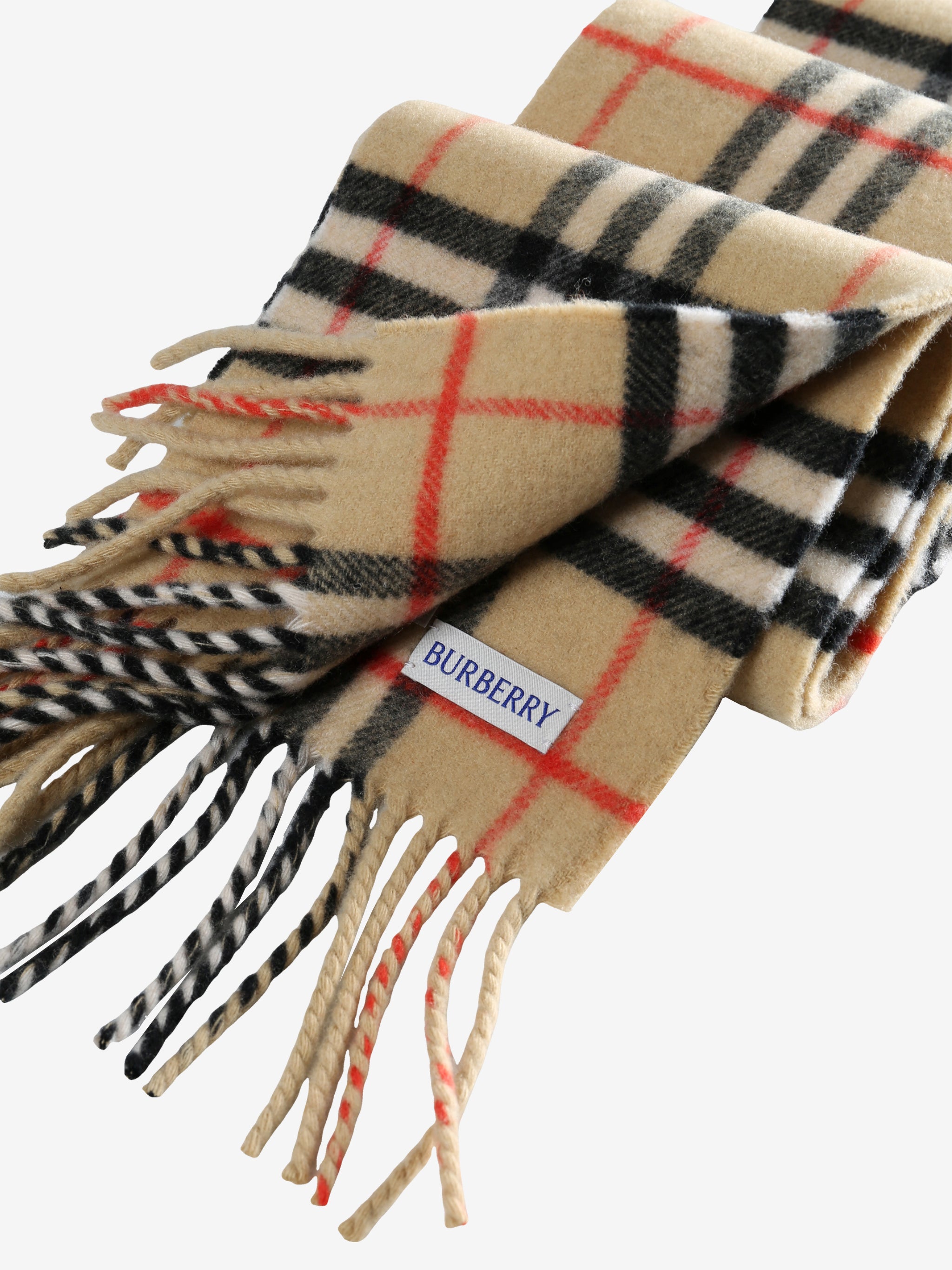 Close up of the tan scarf, showing texture of the cashmere fabric