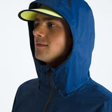 Blue jacket worn by a person, showing the jacket fit